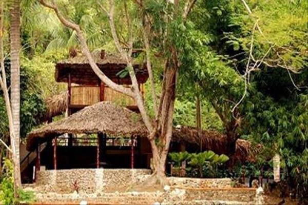 Tanama Jungle Ranch on the banks of the river